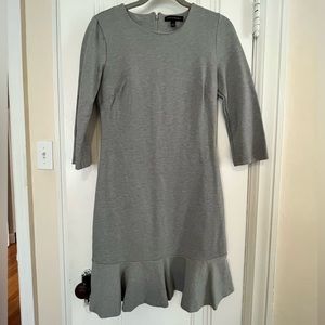 Ponte grey Banana Republic dress with wide hem ruffle.